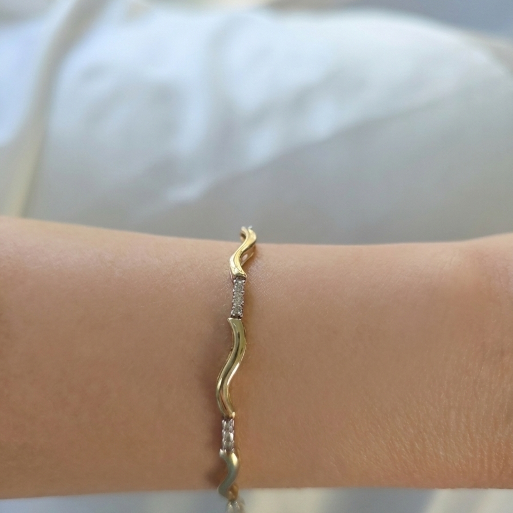Elegant Gold and Silver Bracelet